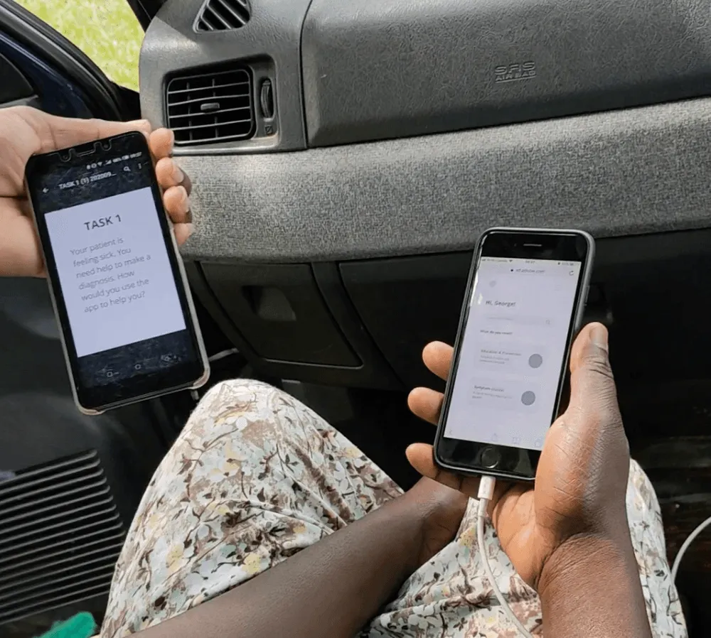 Two people using the app on their phones inside a car