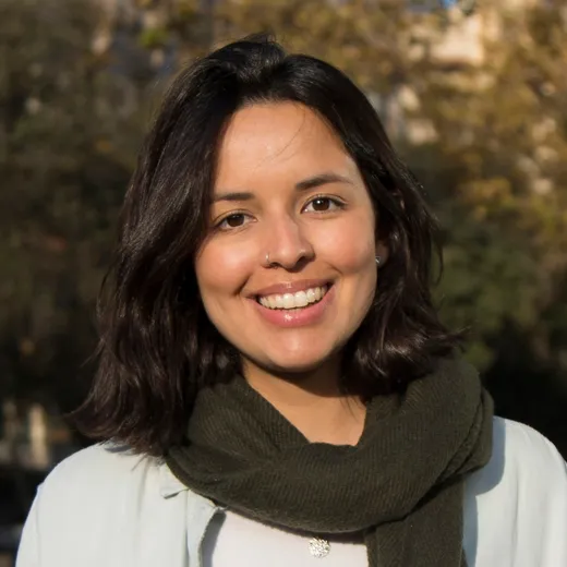 Portrait of Vanessa Canoso smiling, outdoors